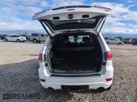 2017 Jeep Grand Cherokee Overland with VIN 1C4RJFCG7HC707767, listed as a Copart auction lot 82345154 with 96,374 mi miles and Salvage Title. Bid and sale history available at carsss.com. Image 6.