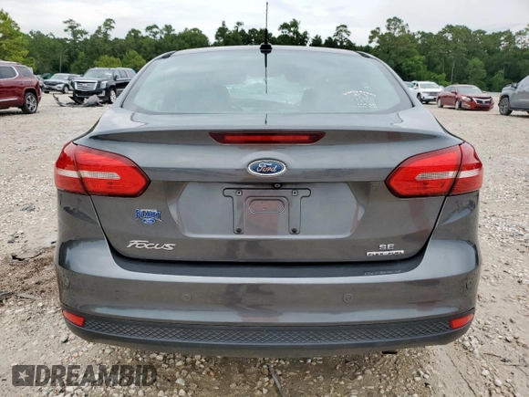2016 Ford Focus SE with VIN 1FADP3F24GL407339, listed as a Copart auction lot 60744875 with 126,073 mi miles and Salvage title. Bid and sale history available at DreamBid. Image 6.