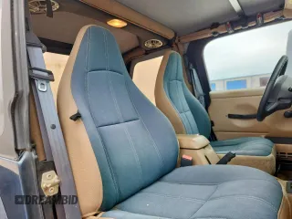 2000 Jeep Wrangler Sahara with VIN 1J4FA59S1YP777549, listed as a Copart auction lot 63622335 with 197,426 mi miles and Clean title. Bid and sale history available at DreamBid. Image 10.
