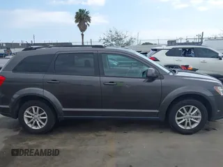 2017 Dodge Journey SXT with VIN 3C4PDCBG3HT618930, listed as a IAAI auction lot 41956400 with 106,185 mi miles and . Bid and sale history available at carsss.com. Image 12.