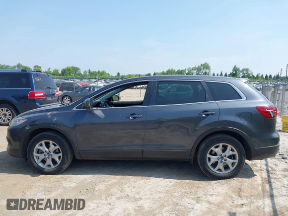 2014 Mazda CX-9 Touring z VIN JM3TB3CA4E0431520, wystawiony jako IAAI lot #42514932 z przebiegiem 119 837 mil mil oraz . Historia ofert i sprzedaży dostępna na DreamBid. Obrazek 14.