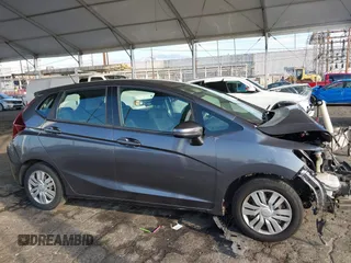 2015 Honda Fit LX with VIN 3HGGK5H58FM713533, listed as a IAAI auction lot 40473868 with Not provided miles and . Bid and sale history available at DreamBid. Image 14.