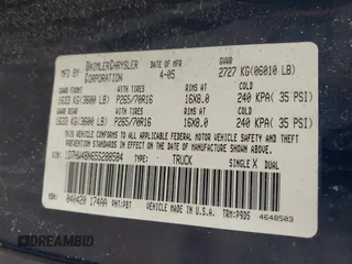 2005 Dodge Dakota SLT with VIN 1D7HW48N65S288584, listed as a IAAI auction lot 42130695 with 221,636 mi miles. Bid and sale history available at carsss.com. Image 9.