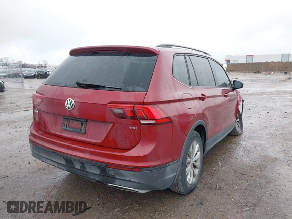 2018 Volkswagen Tiguan S with VIN 3VV1B7AX8JM124827, listed as a IAAI auction lot 41544321 with 101,492 mi miles and . Bid and sale history available at DreamBid. Image 4.
