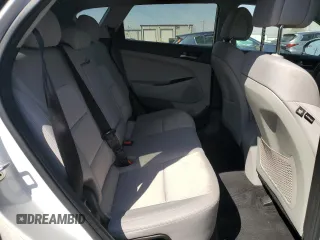 2018 Hyundai Tucson SEL z VIN KM8J33A46JU665618, wystawiony jako Copart lot #53329305 z przebiegiem 146 486 mil mil oraz Szkoda całkowita • Salvage title. Historia ofert i sprzedaży dostępna na DreamBid. Obrazek 11.