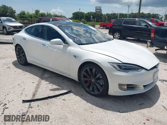 2017 Tesla Model S 100D with VIN 5YJSA1E45HF189006, listed as a IAAI auction lot 42540693 with 64,827 mi miles and . Bid and sale history available at DreamBid. Image 1.