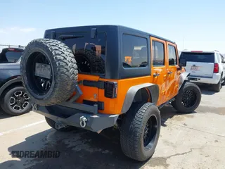 2012 Jeep Wrangler Unlimited Sport RHD with VIN 1C4BJWKGXCL221613, listed as a IAAI auction lot 42327004 with 129,375 mi miles and . Bid and sale history available at DreamBid. Image 4.
