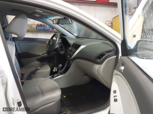 2013 Hyundai Accent GL with VIN KMHCT5AE6DU122559, listed as a IAAI auction lot 41800714 with 129,582 mi miles. Bid and sale history available at carsss.com. Image 5.