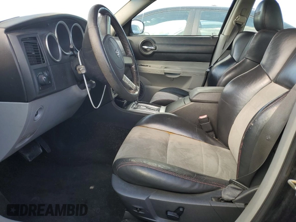 2006 Dodge Charger SRT-8 with VIN 2B3KA73W16H476021, listed as a Copart auction lot 49822835 with 197,111 mi miles and Salvage Title. Bid and sale history available at DreamBid. Image 7.