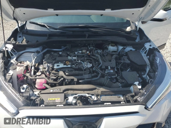 2023 Toyota Corolla Cross Hybrid S with VIN 7MUFBABG5PV008595, listed as a Copart auction lot 60002585 with 9,052 mi miles and Salvage title. Bid and sale history available at DreamBid. Image 12.