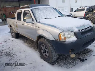2003 Nissan Frontier SE z VIN 1N6ED29X33C433737, wystawiony jako IAAI lot #41271135 z przebiegiem 289 098 mil mil oraz . Historia ofert i sprzedaży dostępna na DreamBid. Obrazek 1.