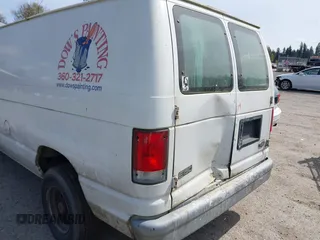 2000 Ford Econoline Cargo with VIN 1FTRE14W7YHA37668, listed as a IAAI auction lot 42001679 with 210,713 mi miles. Bid and sale history available at carsss.com. Image 6.