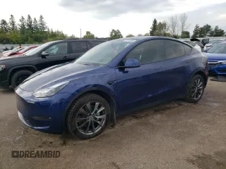 2022 Tesla Model Y Long Range z VIN 7SAYGDEE6NF550034, wystawiony jako Copart lot #70753264 z przebiegiem 58 378 mil mil oraz Czysty tytuł • Clean title. Historia ofert i sprzedaży dostępna na DreamBid. Obrazek 1.