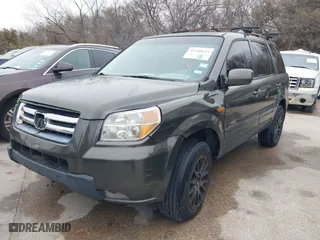 2006 Honda Pilot EX-L with VIN 5FNYF28556B010384, listed as a IAAI auction lot 41380835 with 233,359 mi miles. Bid and sale history available at carsss.com. Image 2.