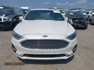 2019 Ford Fusion Titanium with VIN 3FA6P0SU8KR192833, listed as a IAAI auction lot 42818081 with 71,188 mi miles and . Bid and sale history available at DreamBid. Image 12.