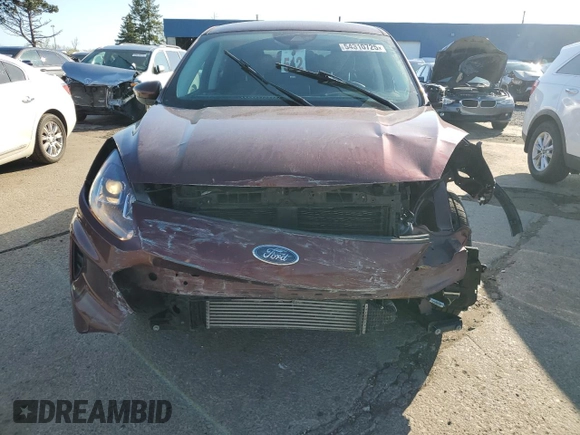 2021 Ford Escape SE with VIN 1FMCU9G67MUA94906, listed as a Copart auction lot 54310725 with 84,595 mi miles and Salvage title. Bid and sale history available at DreamBid. Image 5.
