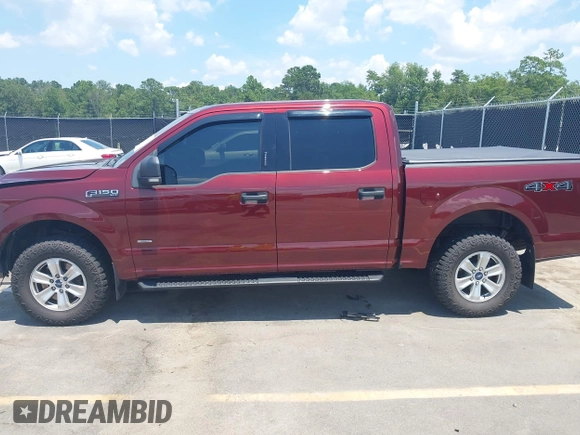 2015 Ford F-150 XLT with VIN 1FTEW1EG4FFC63243, listed as a IAAI auction lot 42566883 with 101,547 mi miles and . Bid and sale history available at DreamBid. Image 14.