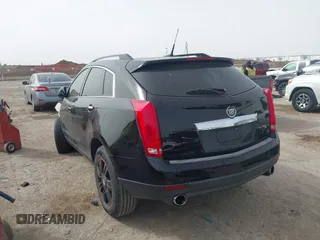 2013 Cadillac SRX z VIN 3GYFNAE3XDS654498, wystawiony jako IAAI lot #41740938 z przebiegiem 134 933 mil mil oraz . Historia ofert i sprzedaży dostępna na DreamBid. Obrazek 3.