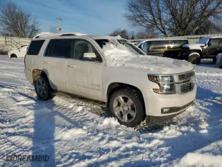 2019 Chevrolet Tahoe LT with VIN 1GNSKBKC5KR108870, listed as a Copart auction lot 45047725 with 126,155 mi miles and Clean Title. Bid and sale history available at carsss.com. Image 4.