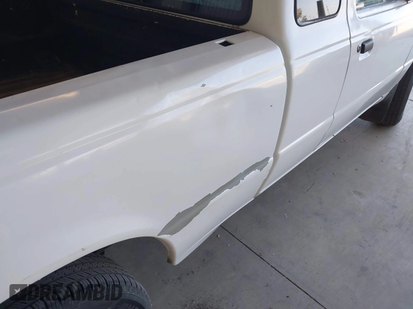 2000 Ford Ranger XL with VIN 1FTYR14VXYTB24131, listed as a IAAI auction lot 42182292 with 263,211 mi miles. Bid and sale history available at carsss.com. Image 6.