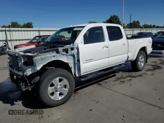 2006 Toyota Tacoma with VIN 5TEMU52N06Z179046, listed as a Copart auction lot 61205755 with 101,027 mi miles and Salvage title. Bid and sale history available at DreamBid. Image 1.