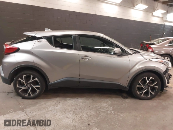 2018 Toyota C-HR XLE z VIN NMTKHMBX5JR039263, wystawiony jako IAAI lot #42265976 z przebiegiem 88 253 mil mil oraz . Historia ofert i sprzedaży dostępna na DreamBid. Obrazek 14.