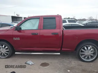 2014 Ram 1500 Tradesman with VIN 1C6RR6FG4ES454808, listed as a IAAI auction lot 41368359 with 233,684 mi miles and . Bid and sale history available at DreamBid. Image 14.