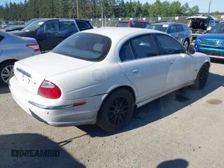 2004 Jaguar S-Type with VIN SAJEA01U74HM96220, listed as a IAAI auction lot 42180627 with 160,015 mi miles and . Bid and sale history available at DreamBid. Image 4.