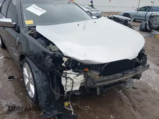 2012 Lincoln MKZ with VIN 3LNHL2GC6CR802963, listed as a IAAI auction lot 41421952 with 203,431 mi miles. Bid and sale history available at carsss.com. Image 6.