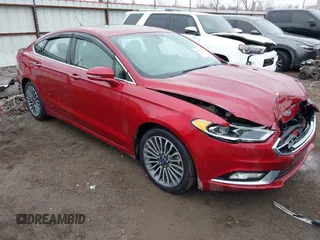 2017 Ford Fusion SE z VIN 3FA6P0H98HR175087, wystawiony jako IAAI lot #41557481 z przebiegiem 103 752 mil mil oraz . Historia ofert i sprzedaży dostępna na DreamBid. Obrazek 1.