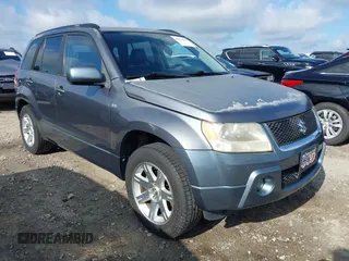 2006 Suzuki Grand Vitara Luxury z VIN JS3TE947864103082, wystawiony jako IAAI lot #42470917 z przebiegiem 155 702 mil mil oraz . Historia ofert i sprzedaży dostępna na DreamBid. Obrazek 1.