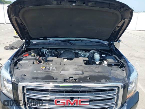2016 GMC Yukon XL SLE with VIN 1GKS1FKC9GR161876, listed as a IAAI auction lot 39948106 with 60,800 mi miles. Bid and sale history available at carsss.com. Image 10.