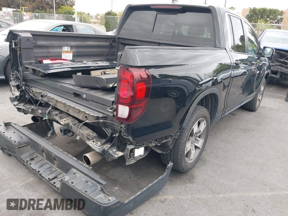 2024 Honda Ridgeline RTL with VIN 5FPYK3F56RB004027, listed as a IAAI auction lot 42049778 with 35,631 mi miles and . Bid and sale history available at DreamBid. Image 4.