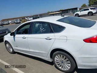 2018 Ford Fusion SE z VIN 3FA6P0LU1JR225930, wystawiony jako IAAI lot #42508239 z przebiegiem 202 272 mil mil oraz . Historia ofert i sprzedaży dostępna na DreamBid. Obrazek 14.
