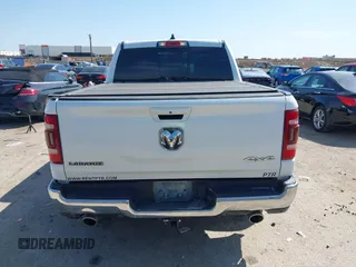 2023 Ram 1500 Laramie with VIN 1C6SRFJT0PN508550, listed as a IAAI auction lot 41913849 with 57,765 mi miles and . Bid and sale history available at DreamBid. Image 16.