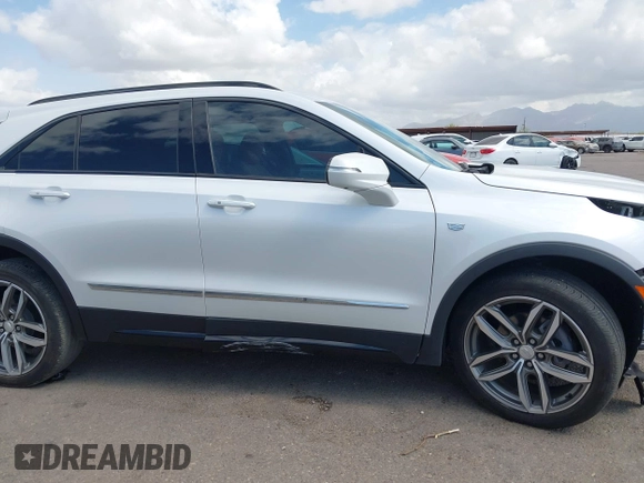 2022 Cadillac XT4 FWD Sport with VIN 1GYFZER44NF164899, listed as a IAAI auction lot 42152554 with 8,058 mi miles and . Bid and sale history available at DreamBid. Image 14.
