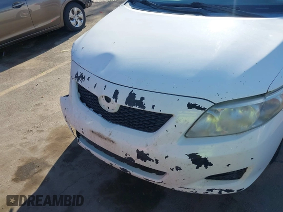 2010 Toyota Corolla with VIN 2T1BU4EE8AC401098, listed as a IAAI auction lot 42357249 with 199,282 mi miles and . Bid and sale history available at DreamBid. Image 12.