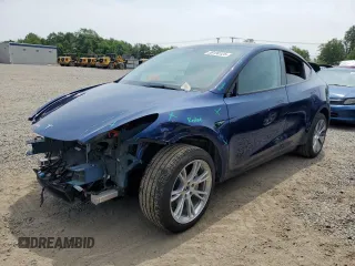 2024 Tesla Model Y Long Range z VIN 7SAYGDEE8RA248635, wystawiony jako Copart lot #59130125 z przebiegiem 21 210 mil mil oraz Szkoda całkowita • Salvage title. Historia ofert i sprzedaży dostępna na DreamBid. Obrazek 1.
