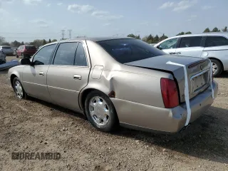 2001 Cadillac DeVille z VIN 1G6KD54YX1U242656, wystawiony jako Copart lot #54566105 z przebiegiem 200 016 mil mil oraz Szkoda całkowita • Salvage title. Historia ofert i sprzedaży dostępna na DreamBid. Obrazek 2.