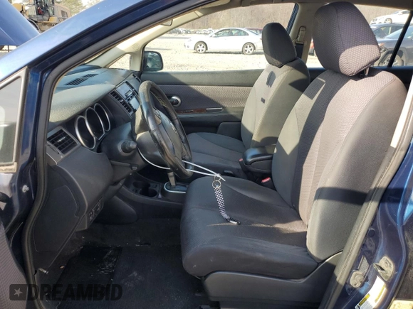 2007 Nissan Versa 1.8 S with VIN 3N1BC13EX7L418854, listed as a Copart auction lot 50765145 with 334,472 mi miles and Salvage Title. Bid and sale history available at carsss.com. Image 7.