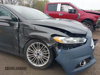 2016 Ford Fusion SE with VIN 3FA6P0H9XGR402567, listed as a IAAI auction lot 41968253 with 62,697 mi miles and . Bid and sale history available at DreamBid. Image 12.