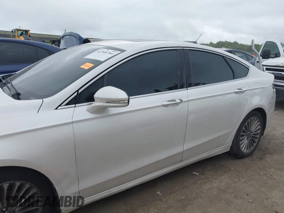 2016 Ford Fusion Titanium with VIN 3FA6P0K96GR103571, listed as a IAAI auction lot 42340764 with 180,870 mi miles and . Bid and sale history available at DreamBid. Image 14.