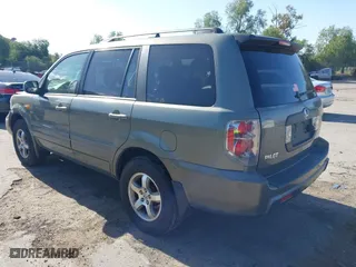 2007 Honda Pilot EX-L with VIN 5FNYF28727B041336, listed as a IAAI auction lot 41926326 with 102,927 mi miles. Bid and sale history available at carsss.com. Image 3.
