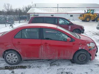 2009 Toyota Yaris with VIN JTDBT903991314767, listed as a IAAI auction lot 41615264 with 252,957 mi miles. Bid and sale history available at carsss.com. Image 13.