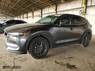 2020 Mazda CX-5 Touring with VIN JM3KFACM6L0804410, listed as a Copart auction lot 51009465 with 55,498 mi miles and Salvage Title. Bid and sale history available at carsss.com. Image 1.