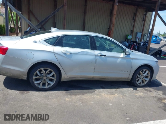 2017 Chevrolet Impala LT with VIN 2G1105S31H9197165, listed as a IAAI auction lot 42303730 with 232,046 mi miles and . Bid and sale history available at DreamBid. Image 13.