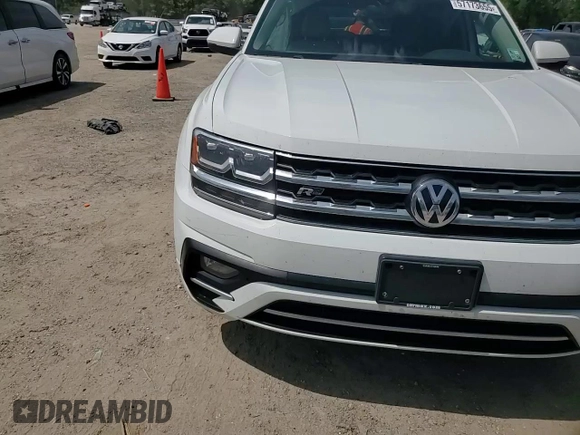 2018 Volkswagen Atlas SE with VIN 1V2PR2CA4JC520706, listed as a Copart auction lot 57173655 with 119,753 mi miles and Salvage title. Bid and sale history available at DreamBid. Image 13.