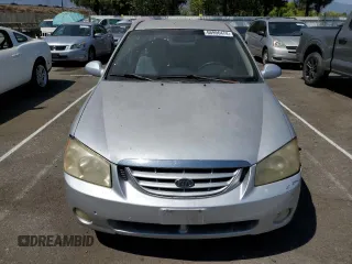2005 Kia Spectra LX with VIN KNAFE122855179475, listed as a Copart auction lot 66996474 with 187,674 mi miles and Salvage Title. Bid and sale history available at carsss.com. Image 5.