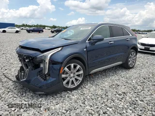 2020 Cadillac XT4 FWD Premium Luxury z VIN 1GYFZCR40LF085229, wystawiony jako Copart lot #60400865 z przebiegiem Nie podano mil oraz Szkoda całkowita • Salvage title. Historia ofert i sprzedaży dostępna na DreamBid. Obrazek 1.