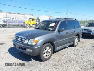 2003 Lexus LX with VIN JTJHT00W233532297, listed as a IAAI auction lot 42189676 with 235,992 mi miles. Bid and sale history available at carsss.com. Image 18.